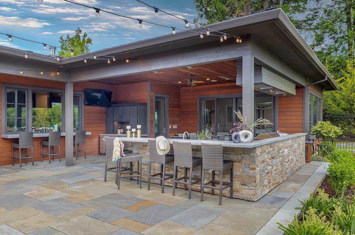 A luxury outdoor cabana to illustrate exterior home design remodeling.