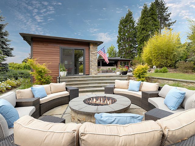 After image of a fire pit, revealing the enhanced and updated state with modern features and improved aesthetics.