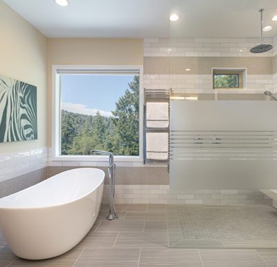 After image of a bathtub, highlighting the transformed state with modern fixtures and improved design.