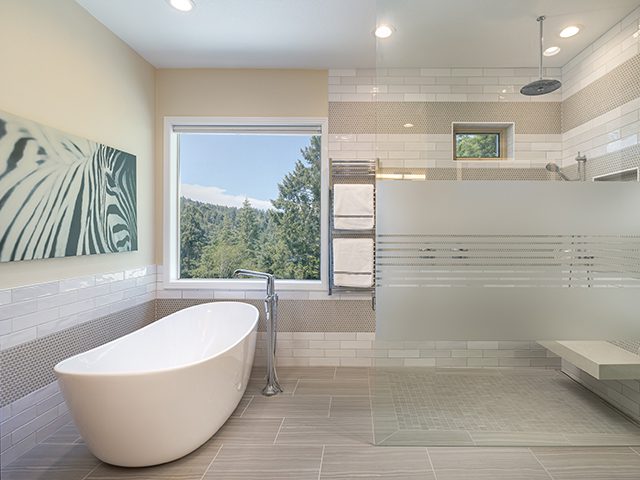 After image of a bathtub, highlighting the transformed state with modern fixtures and improved design.