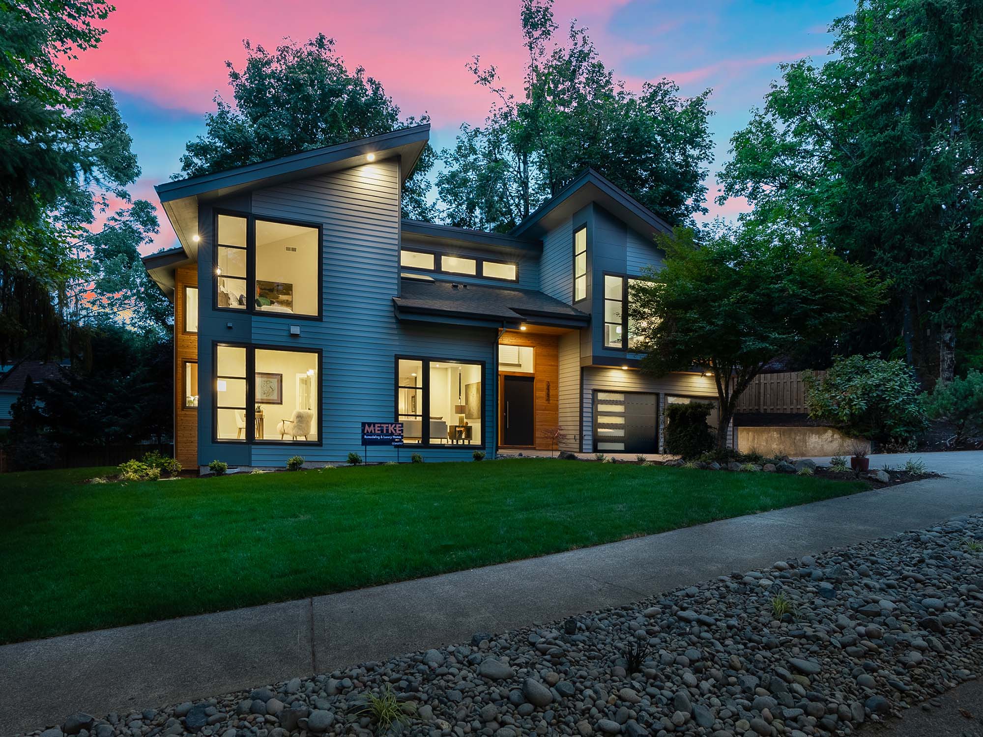 Exterior of a luxury home in Lake Oswego at sunset