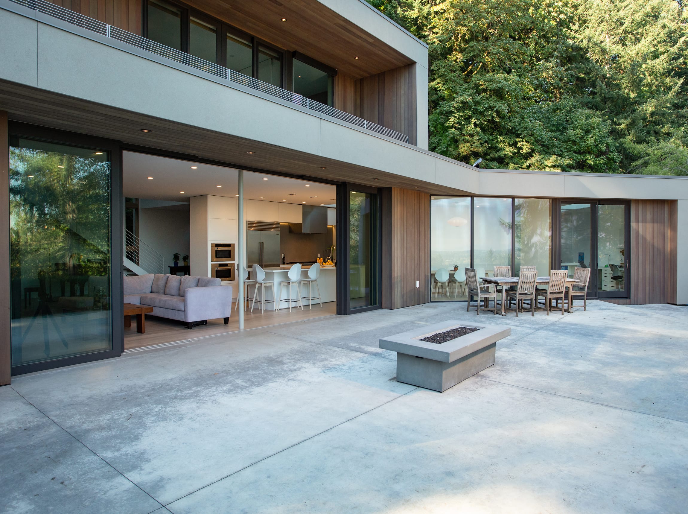 Photo of a luxury home featuring large sliding glass doors