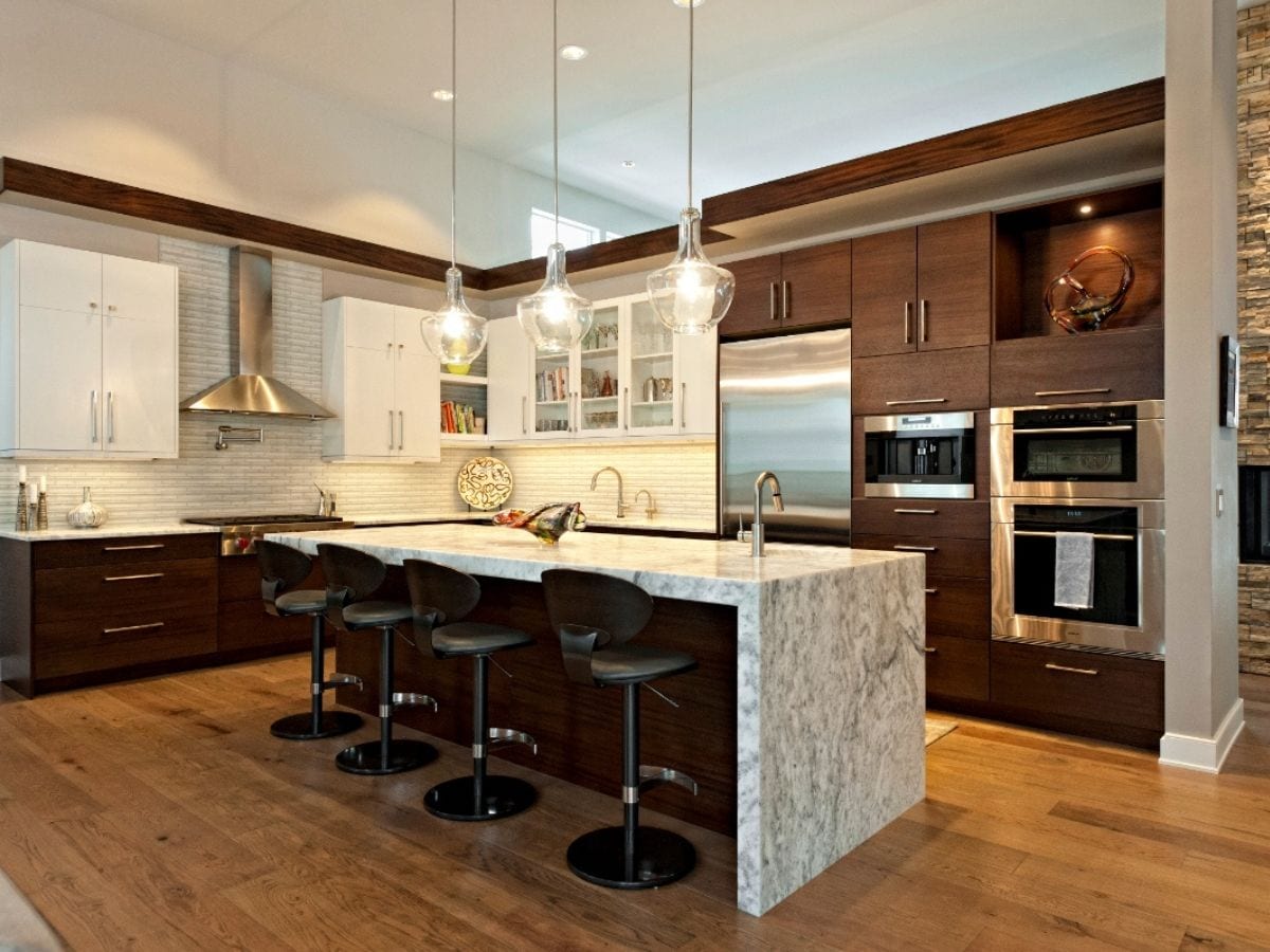 After picture of the kitchen in the Canal residence, displaying the renovated and modernized space