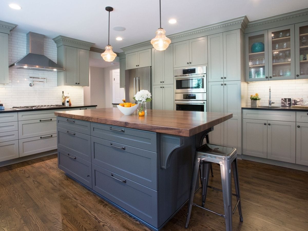 Luxury home kitchen remodel featuring a custom wood island