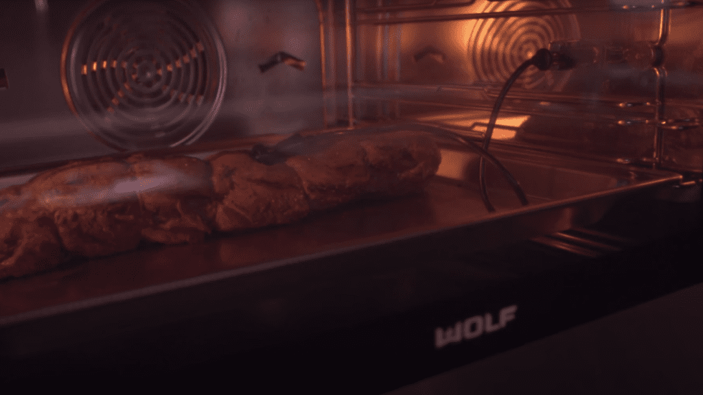 Inside of a Wolf Steam Oven cooking beef tenderloin